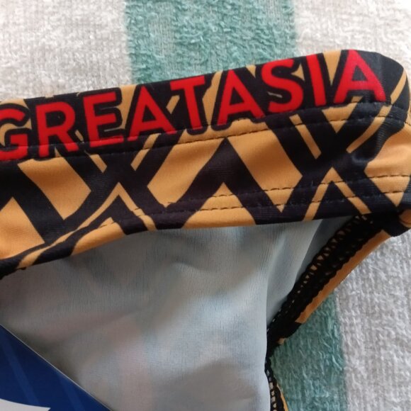 NWT GREAT ASIA TEXT SWIM BRIEF, ASIAN SIZE "L", (~32") GOLD / BLACK PATTERN - Picture 3 of 8